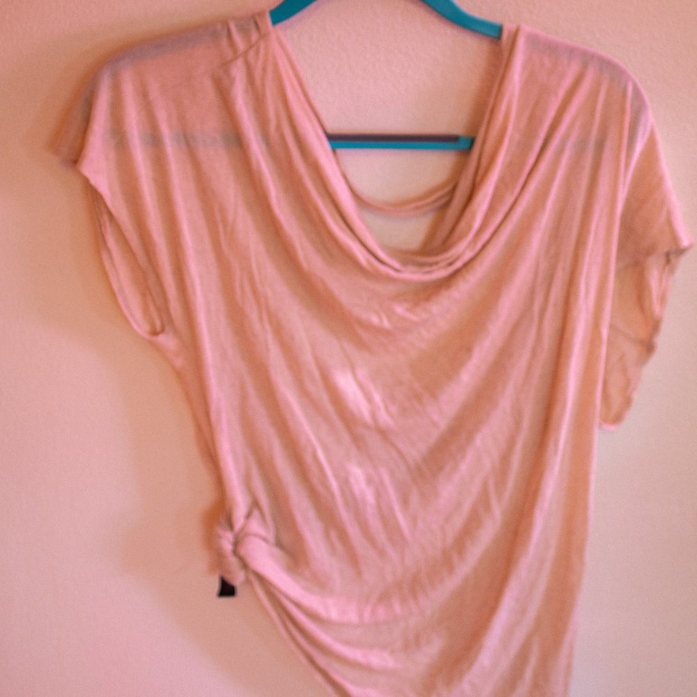 Relaxed fit top, deep open back